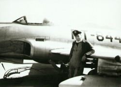 Captain Broughton in front of his F80